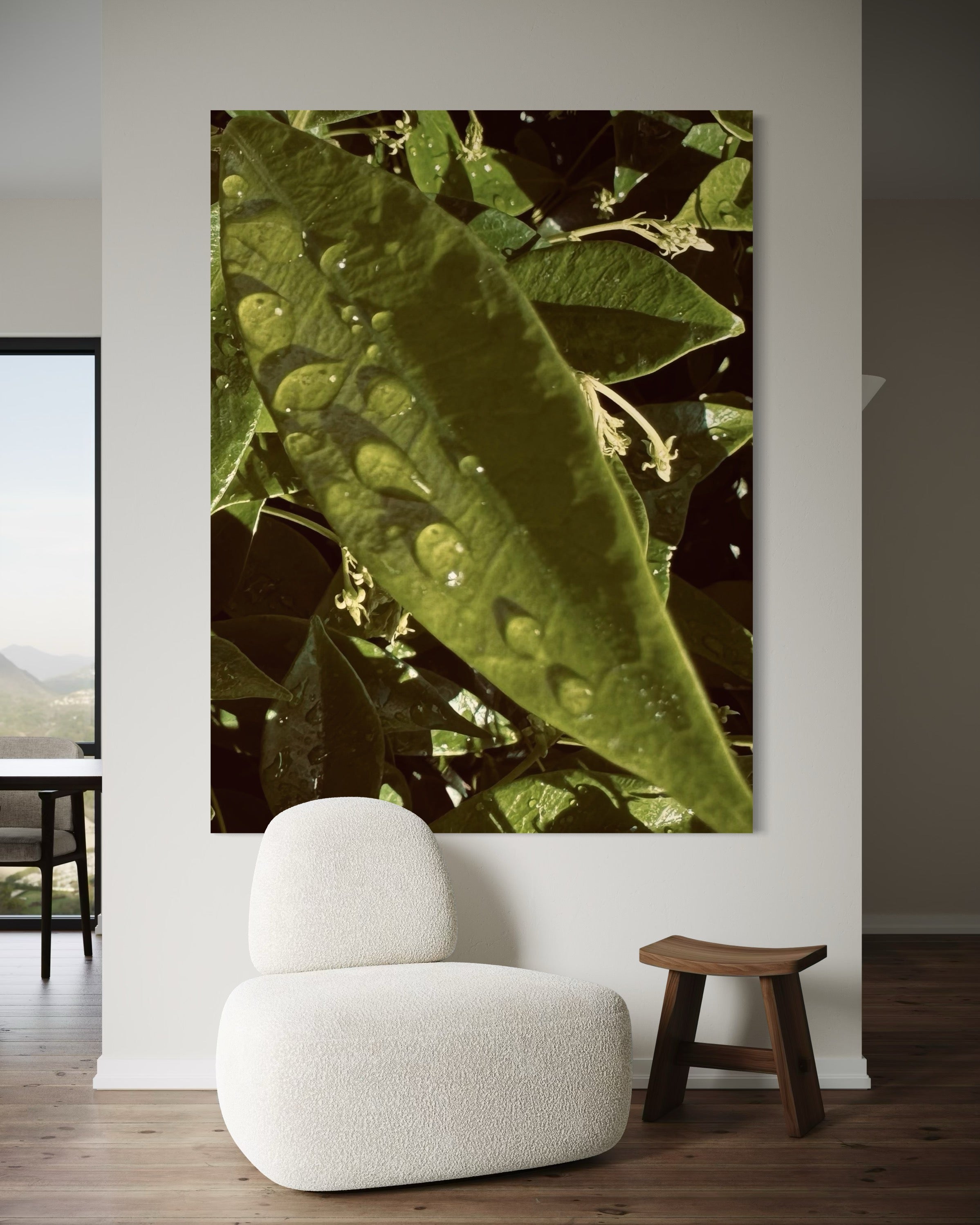 Lumen displayed in a minimal white interior, paired with a sculptural lounge chair and warm natural light.