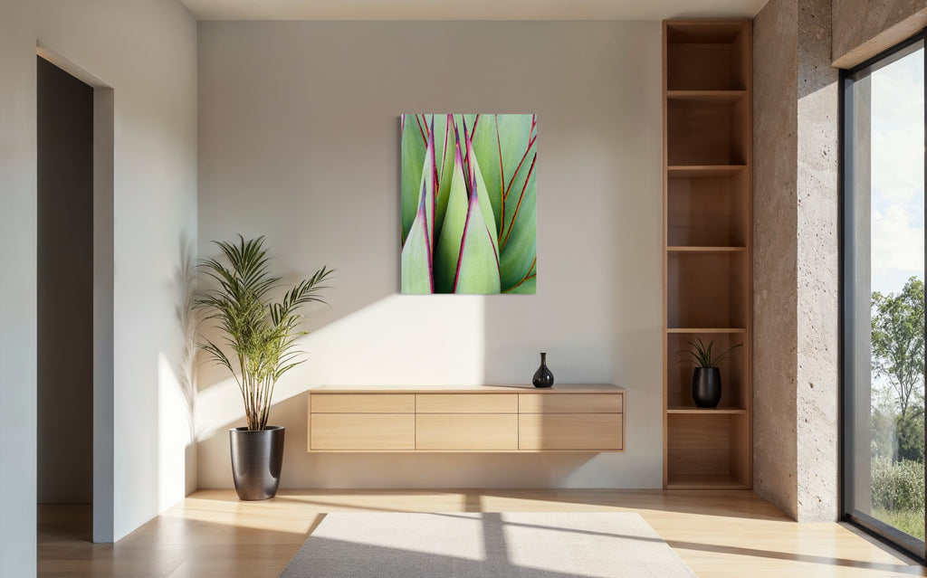 “Verdant Lines” fine art print displayed above a light-wood console in a sunlit modern interior with a tall indoor plant.

