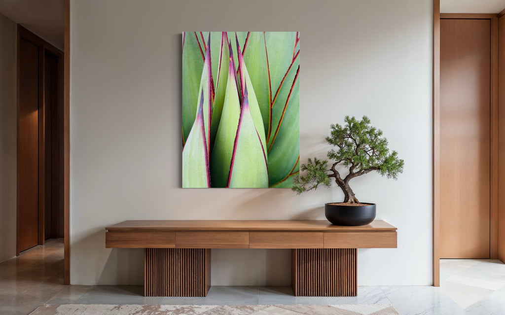 “Verdant Lines” fine art print displayed above a modern wood console with a bonsai tree in a minimalist interior.

