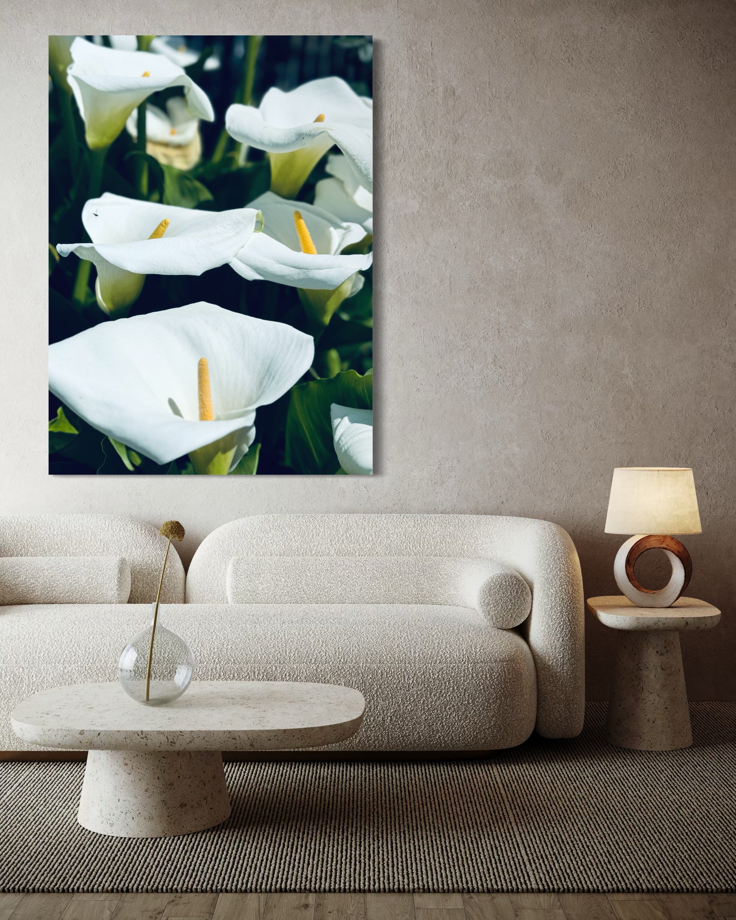 “Silent Grace” positioned above a curved cream sofa, adding quiet refinement to a textured, minimalist room.