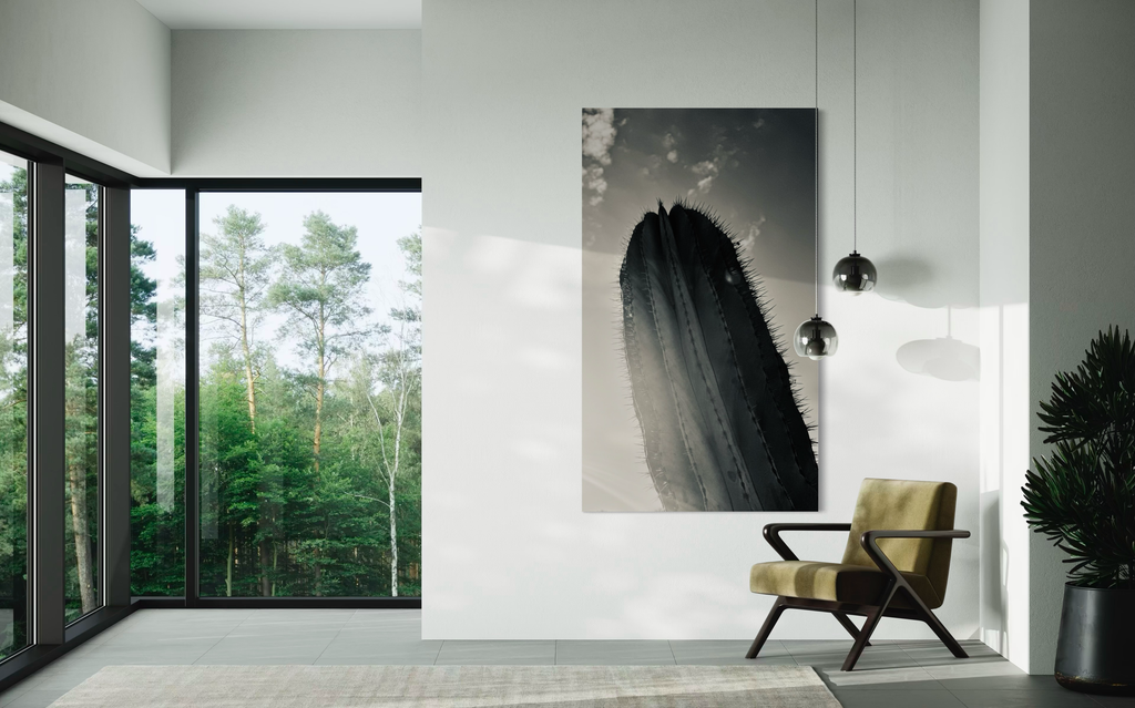 Desert Ascend — sleek desert silhouette positioned in a minimalist room with floor-to-ceiling windows.