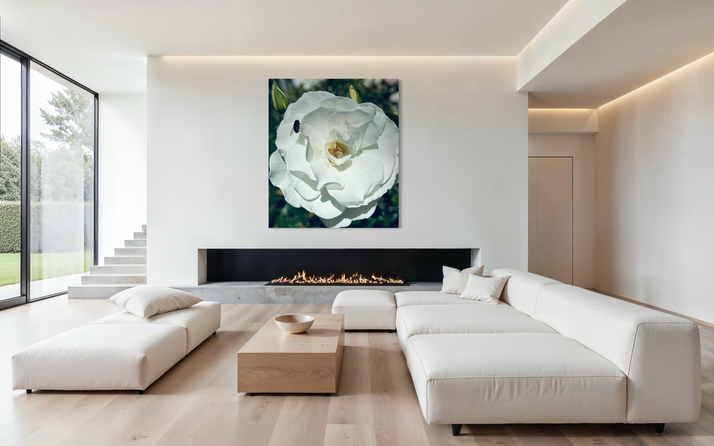 ‘The Visitor’ showcased above a sleek contemporary fireplace, adding organic elegance to a modern living room.