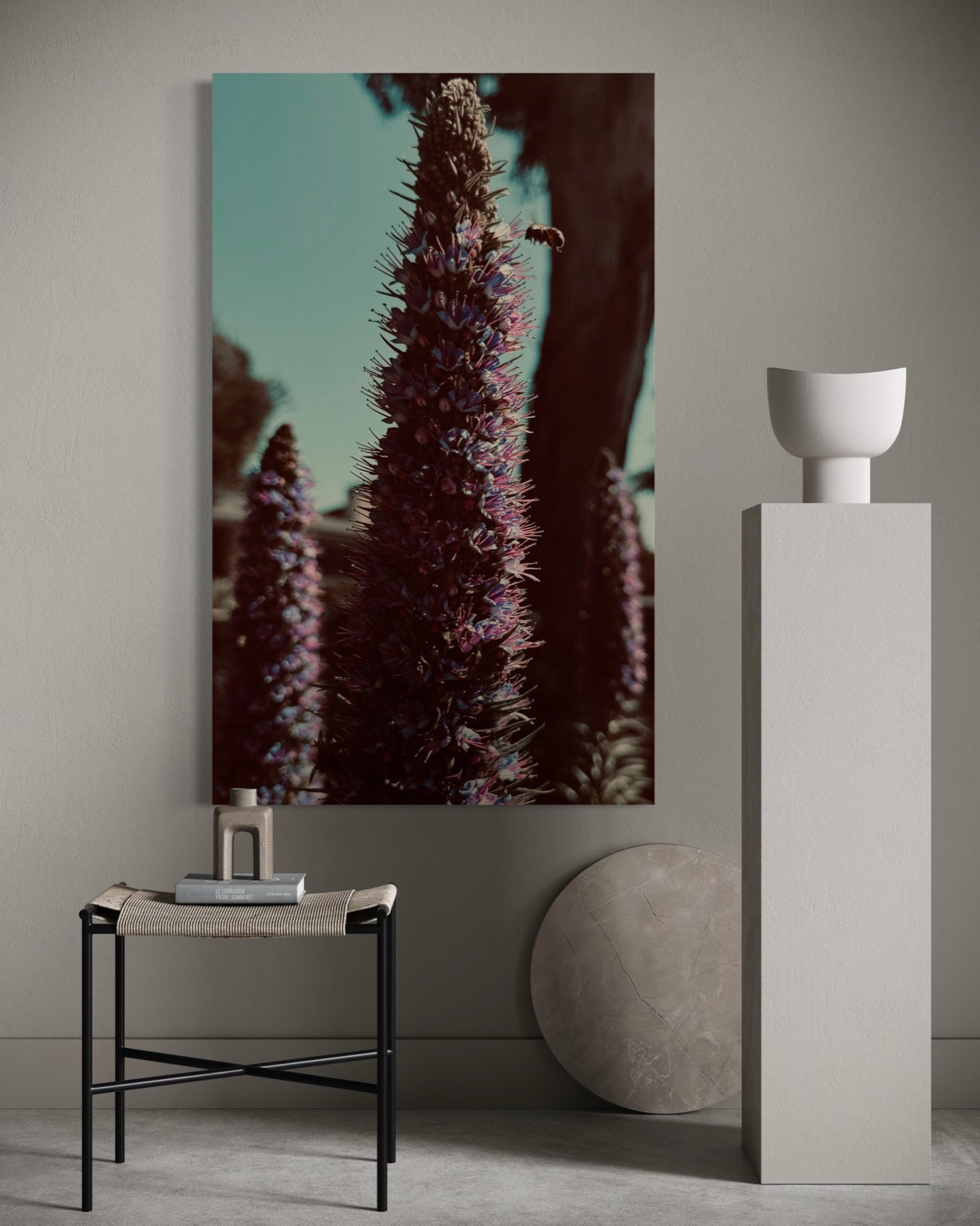 Whispers of Lavender styled above a pedestal and sculptural decor in a refined modern interior.
