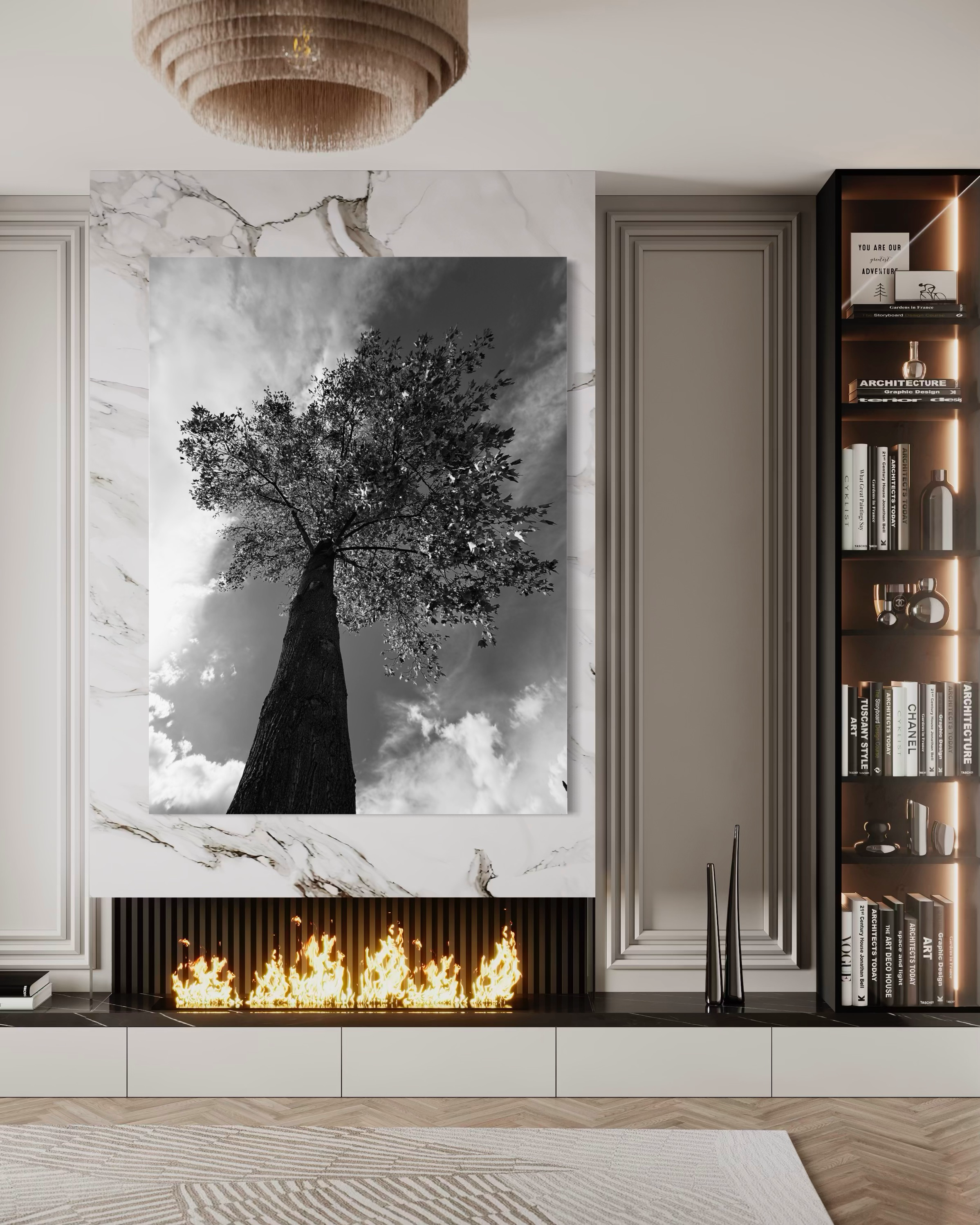 Striking monochrome tree artwork centered above a marble fireplace in an elegant, refined living space.