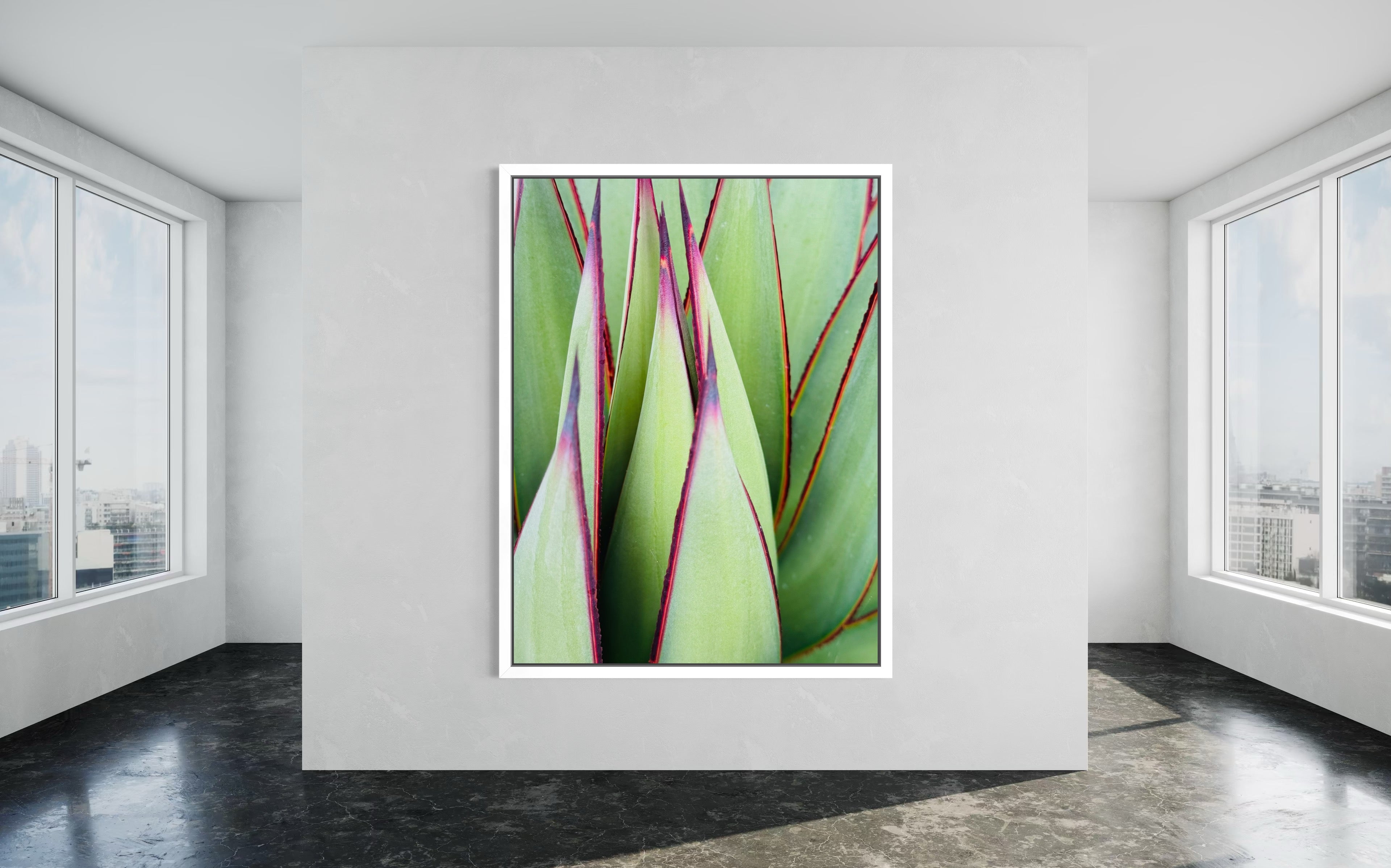 Verdant Lines fine art print in a white floating frame, showcased in a minimalist room with clean, bright tones.”

