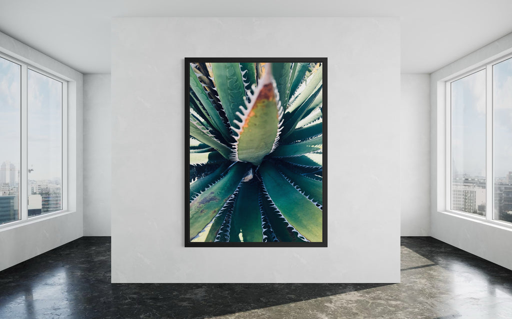 Etherea framed in a matte black floating frame.