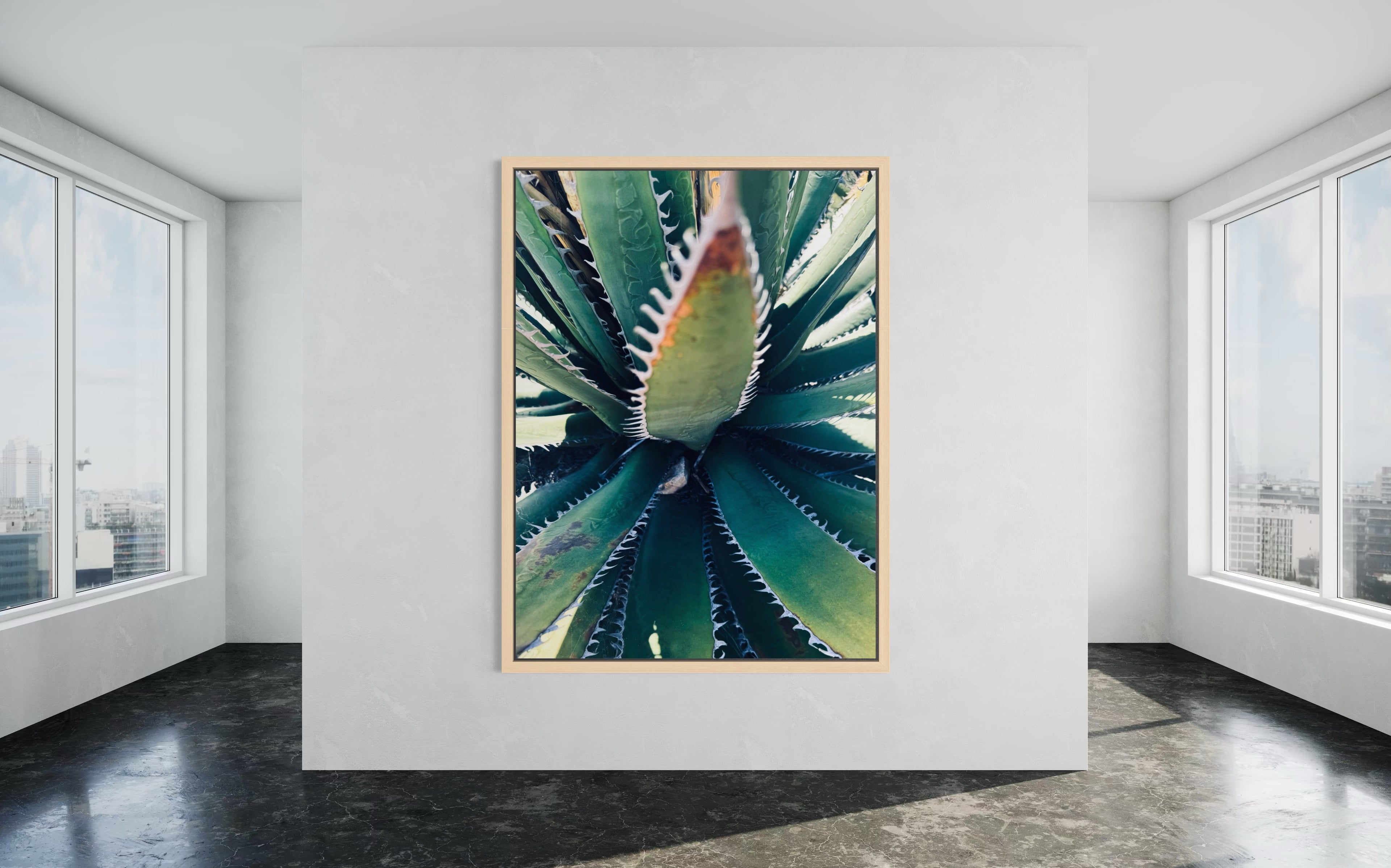 Etherea framed in a natural wood floating frame.